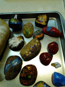 A sampling of some painted by customers during past rock painting times.